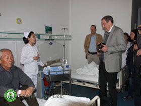 everything is new to the visitors here. they are looking around the bed-wards of our medical center.