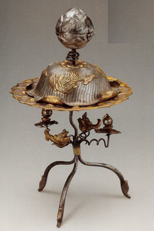 gilded silver salt cellar with sea monster motif and bud handle