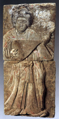 female dancer, polychrome brick relief